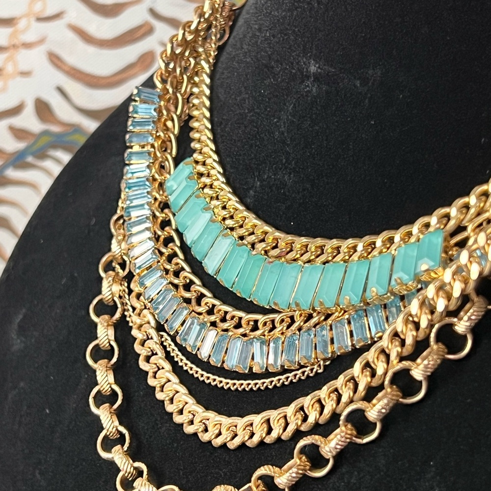 Gold tone and simulated gemstone multi-strand necklace